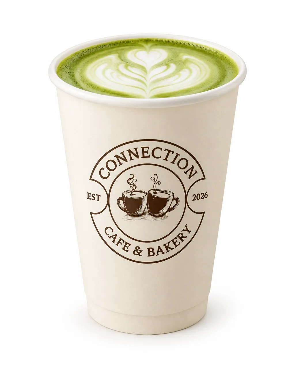 Front-facing Connection Cafe & Bakery badge on a warm ivory takeaway cup of matcha latte