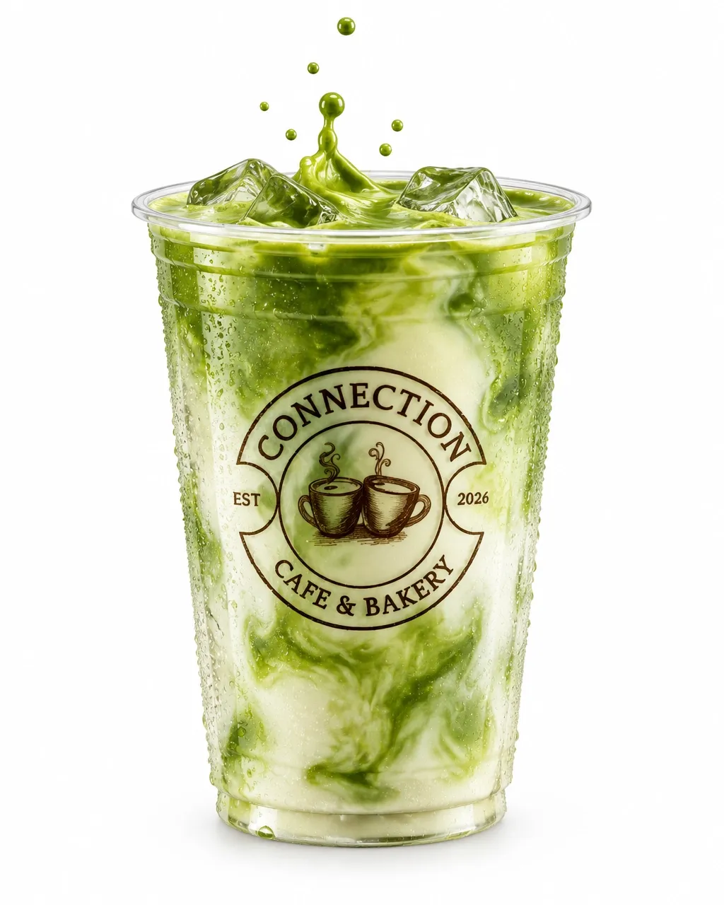 Front-facing Connection Cafe & Bakery badge on a clear iced matcha latte cup with condensation